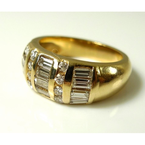 789 - A 14ct gold and diamond dress ring, circa 1965, set with three bands of baguette cut and two bands o... 