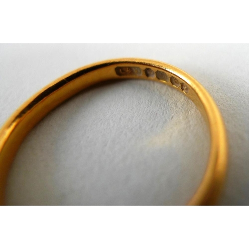 794 - A 22ct gold wedding band, size I, 2.7g, a Victorian 18ct gold mourning ring set with three seed pear... 