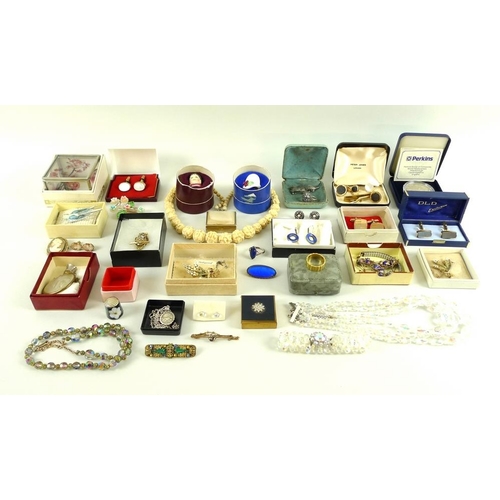 809 - A collection of costume jewellery, including a silver and marcasite Art Deco ring, earrings and broo... 