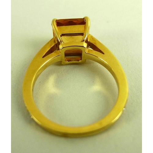 816 - An 18K gold, diamond and citrine solitaire dress ring, the square cut citrine of approximately 8 by ... 