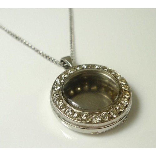 819 - A vintage white metal watch case locket pendant, 22mm, set with twenty four diamonds, marked 5068, o... 