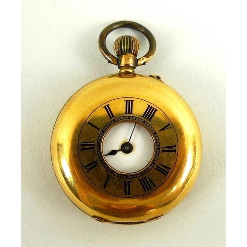 824 - A lady's 18K gold half hunter pocket watch, with B & Cie movement, white enamel dial with black Roma... 