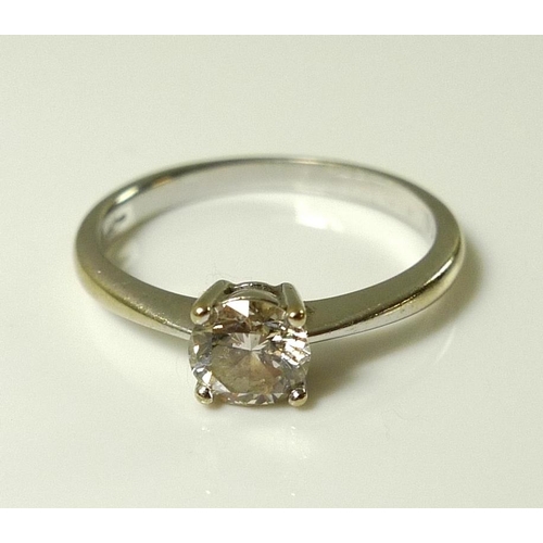 829 - An 18ct white gold and diamond solitaire ring, the brilliant cut diamond of approx 0.5ct, size K, 2.... 