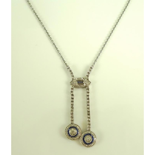 831 - An Art Deco style diamond and sapphire pendant necklace, set with asymmetric circlet drops, 9.7g tot... 