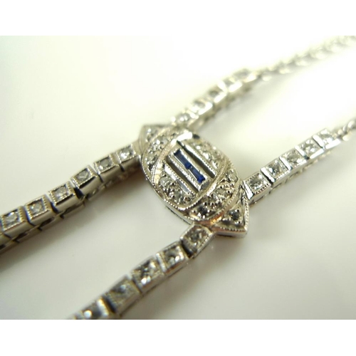 831 - An Art Deco style diamond and sapphire pendant necklace, set with asymmetric circlet drops, 9.7g tot... 