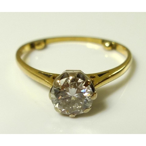 832 - A diamond solitaire ring, the brilliant cut stone approx 0.7ct, on unmarked gold band with later nub... 