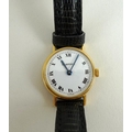 A lady's Cartier 18K gold cased wristwatch, circular white dial with black Roman numerals and minute... 