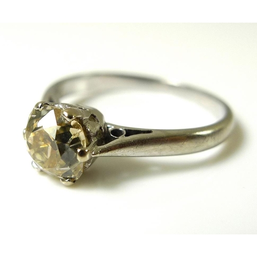 837 - An 18ct white gold and diamond solitaire ring, the old cut diamond of approximately 0.7ct, size l, 2... 