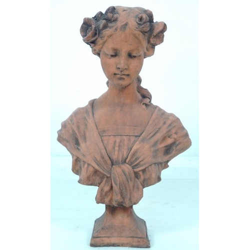 847 - A modern terracotta bust, modelled as a young girl in Art Nouveau style with flowers in her hair, 31... 