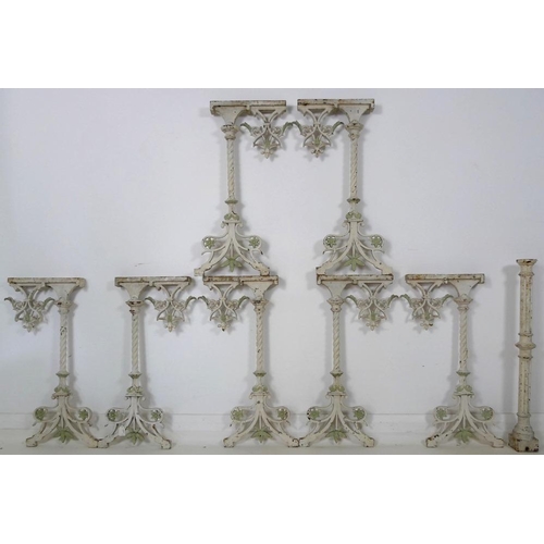 854 - A set of 19th century conservatory cast iron bench stands in the Gothic Revival taste, the table sup... 