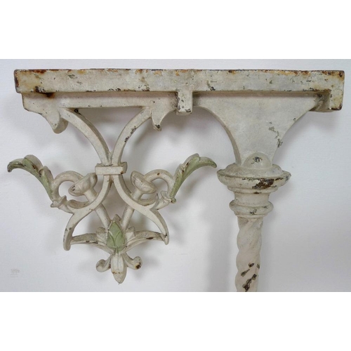 854 - A set of 19th century conservatory cast iron bench stands in the Gothic Revival taste, the table sup... 