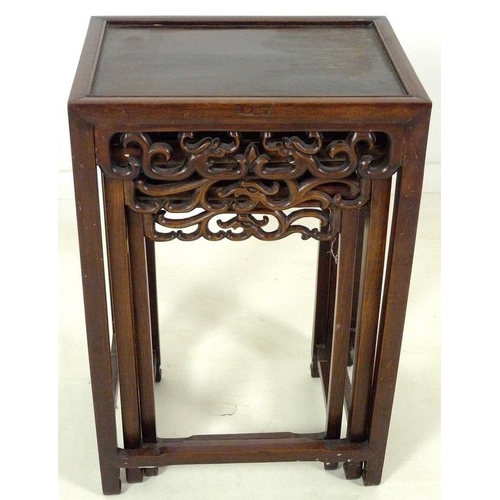 862 - A nest of three Chinese rosewood occasional tables, late 19th / early 20th century, each of rectangu... 