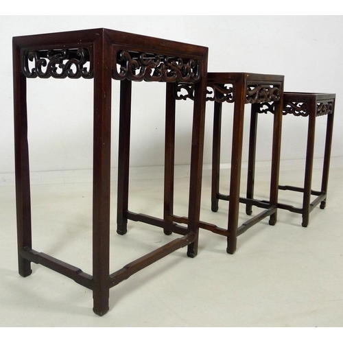 862 - A nest of three Chinese rosewood occasional tables, late 19th / early 20th century, each of rectangu... 