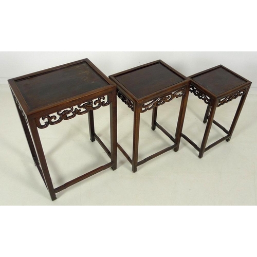 862 - A nest of three Chinese rosewood occasional tables, late 19th / early 20th century, each of rectangu... 