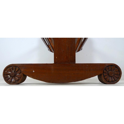 865 - An early to mid mahogany cradle and stand, carved in Arts and Crafts Gothic style, with bone or ivor... 