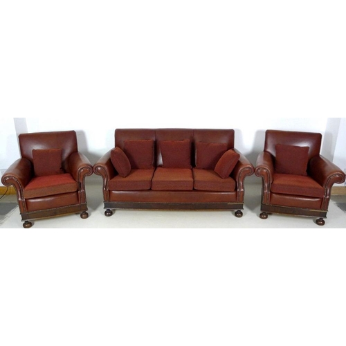 866 - A brown leather three piece suite, mid 20th century, comprising a three seater sofa, 180 by 83 by 90... 