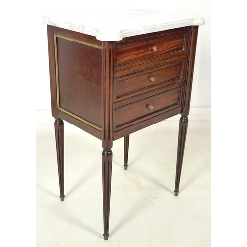 868 - A French late 19th / early 20th century mahogany bedside table, in the Directoire style, with grey v... 