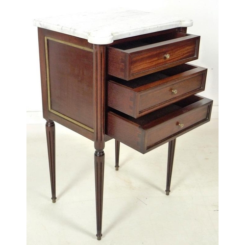 868 - A French late 19th / early 20th century mahogany bedside table, in the Directoire style, with grey v... 