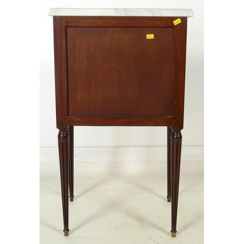 868 - A French late 19th / early 20th century mahogany bedside table, in the Directoire style, with grey v... 