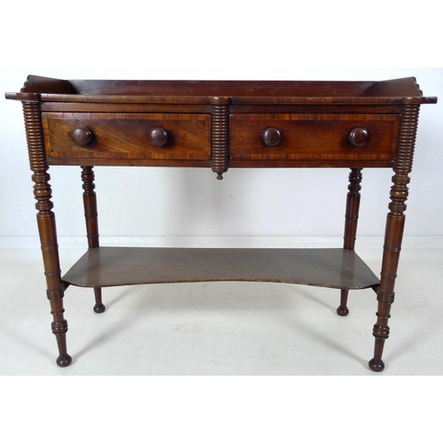 875 - A Victorian mahogany dressing table, with three quarter upstand, two frieze drawers, turned handles,... 