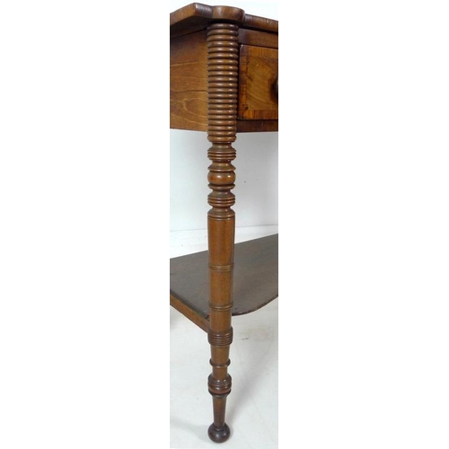 875 - A Victorian mahogany dressing table, with three quarter upstand, two frieze drawers, turned handles,... 