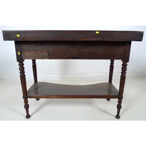 875 - A Victorian mahogany dressing table, with three quarter upstand, two frieze drawers, turned handles,... 