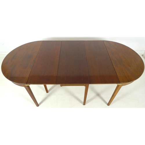 879 - A Georgian with later parts mahogany D-end dining table, central section with drop leaves, plain fri... 