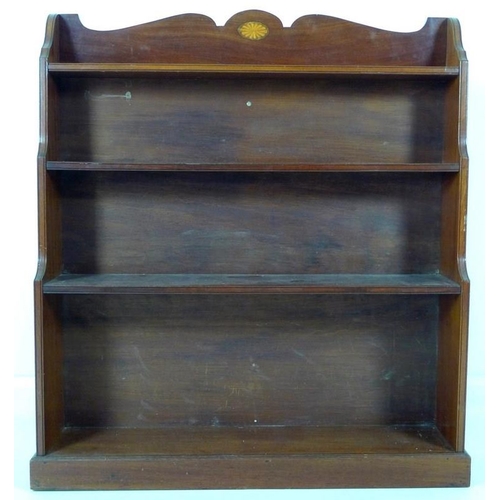 883 - An Edwardian mahogany waterfall freestanding bookcase, inlaid fan paterae decoration to the shaped g... 