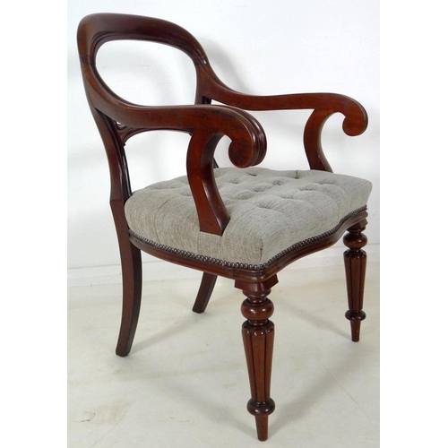 884 - A pair of 19th century open armed library chairs, by Gillows, shaped backs with scroll arms, the sea... 