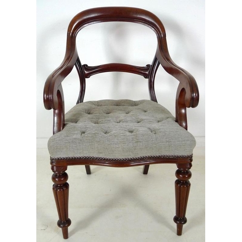 884 - A pair of 19th century open armed library chairs, by Gillows, shaped backs with scroll arms, the sea... 