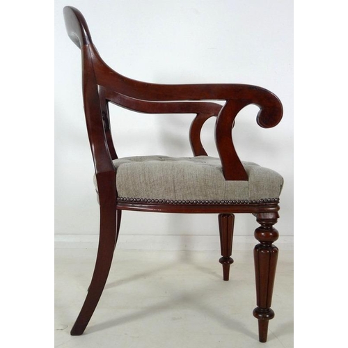 884 - A pair of 19th century open armed library chairs, by Gillows, shaped backs with scroll arms, the sea... 