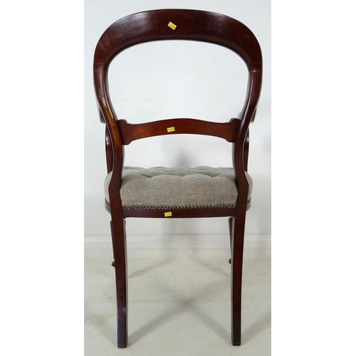 884 - A pair of 19th century open armed library chairs, by Gillows, shaped backs with scroll arms, the sea... 