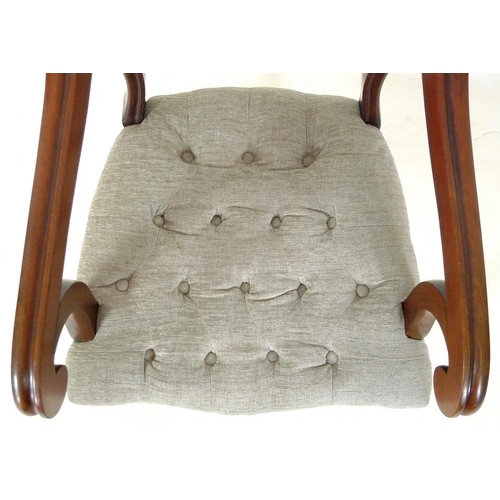 884 - A pair of 19th century open armed library chairs, by Gillows, shaped backs with scroll arms, the sea... 