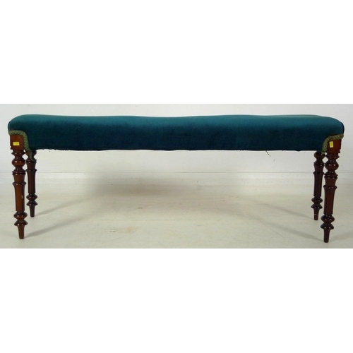 886 - An early Victorian / William IV mahogany serpentine window seat, upholstered in blue velvet, of tape... 