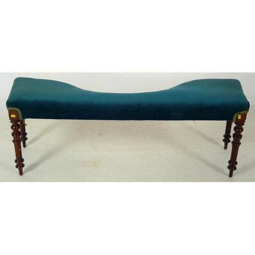 886 - An early Victorian / William IV mahogany serpentine window seat, upholstered in blue velvet, of tape... 