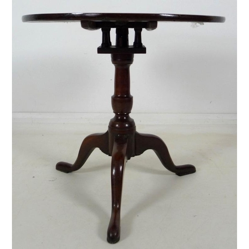 891 - A Georgian with later amendments birdcage tripod table, with circular surface, baluster support and ... 