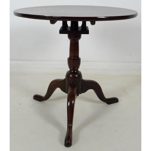 891 - A Georgian with later amendments birdcage tripod table, with circular surface, baluster support and ... 