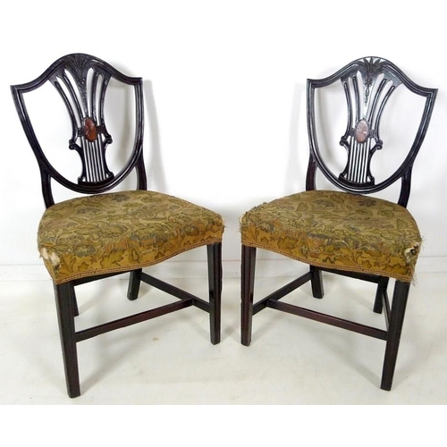 892 - A pair of George III Hepplewhite style mahogany dining chairs, circa 1790, carved, moulded and inlai... 