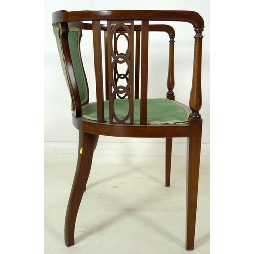 894 - Two Edwardian inlaid mahogany chairs, comprising an inlaid tub chair with green foliate upholstery, ... 