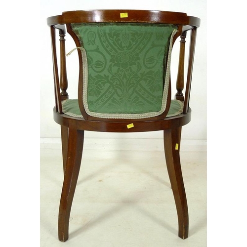 894 - Two Edwardian inlaid mahogany chairs, comprising an inlaid tub chair with green foliate upholstery, ... 