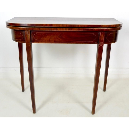 896 - A 19th century inlaid mahogany tea table, of D form with inlaid frieze, raised on tapering square se... 