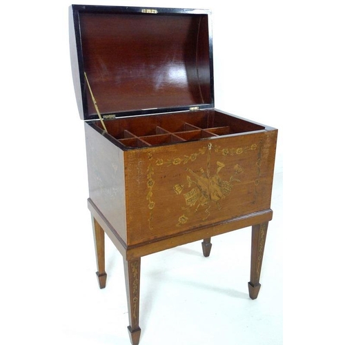 897 - A Victorian mahogany cellerette, inlaid, crossbanded and penwork decorated with musical and floral m... 