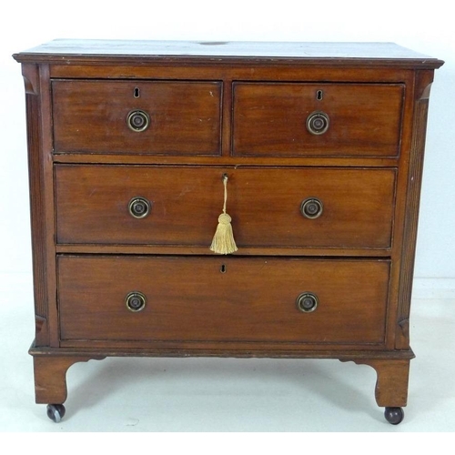 900 - An early Victorian mahogany chest of two short over two long drawers, with cock beading and ring han... 