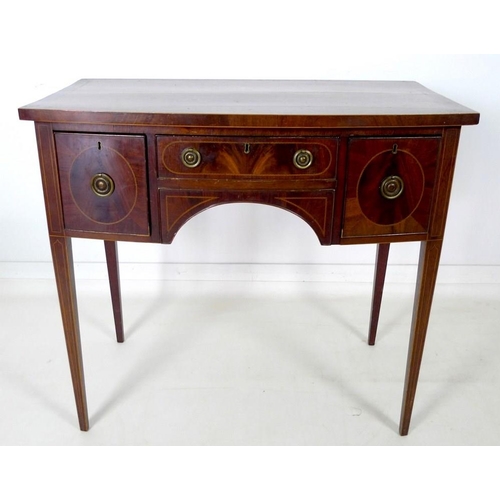 901 - A small Regency style mahogany bow fronted sideboard, with crossbanded top and inlaid stringing, one... 