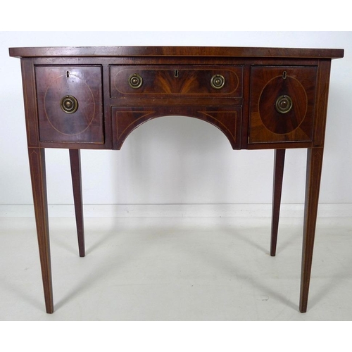 901 - A small Regency style mahogany bow fronted sideboard, with crossbanded top and inlaid stringing, one... 