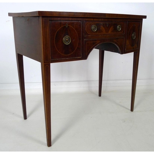 901 - A small Regency style mahogany bow fronted sideboard, with crossbanded top and inlaid stringing, one... 