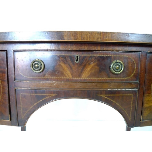 901 - A small Regency style mahogany bow fronted sideboard, with crossbanded top and inlaid stringing, one... 