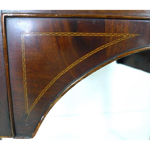 901 - A small Regency style mahogany bow fronted sideboard, with crossbanded top and inlaid stringing, one... 