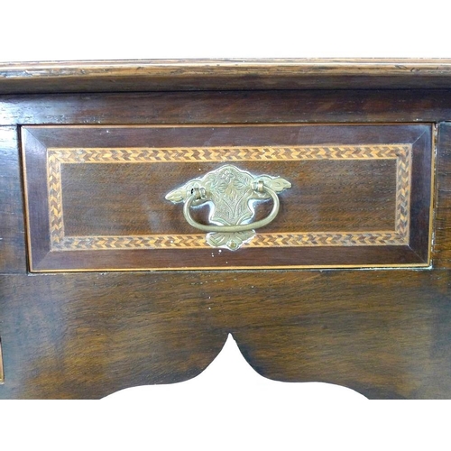 904 - A 19th century lowboy, moulded surface inlaid with feather banding, fitted with one dummy and two dr... 