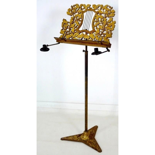 905 - A Regency painted wood and toleware music stand, circa 1820, fretwork carved stand with central styl... 